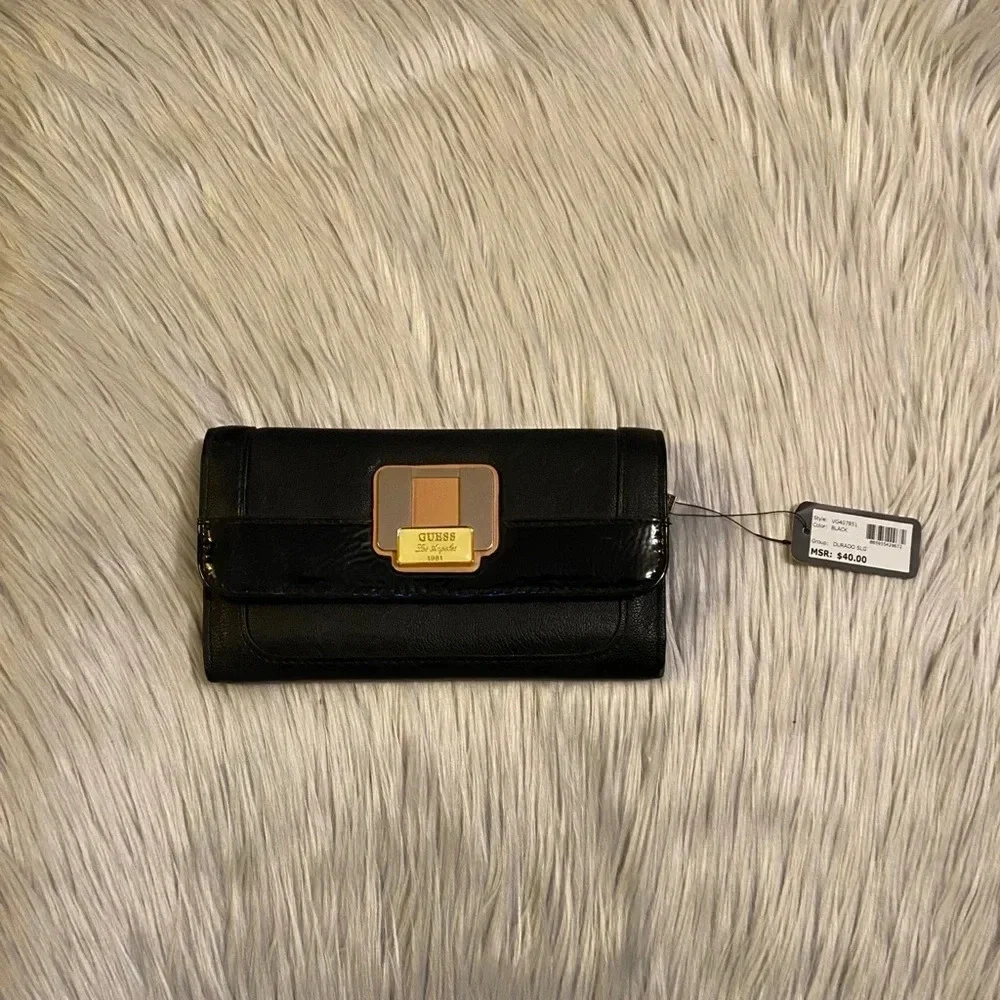 🆕 Guess Black with Tan Accent Buckle on Front Wallet